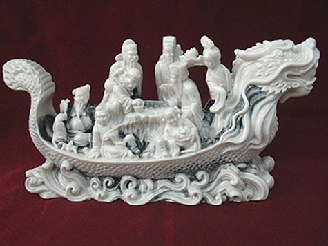 Ceramic boat with eight immortals