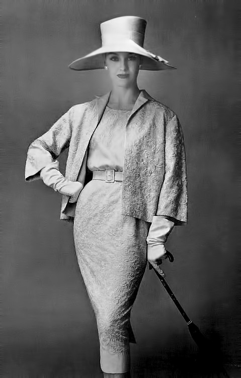 1957-Barbara-Cailleux-in-slim-embroidered-linen-dress-belted-in-same-fabric-belt,-worn-with-short-buttonless-jacket,-by-Pierre-Balmain,-photo-by-Georges-Saad