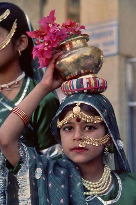 Girl carrying brass pot Welcome-Ceremony.-Rajasthan,-Northern-India