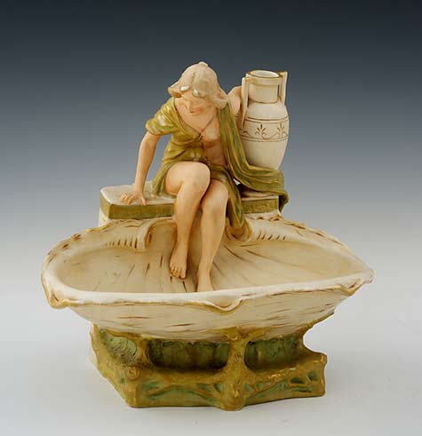 Royal-Dux-Art-Nouveau ceramic sculpture of a girl with a pot