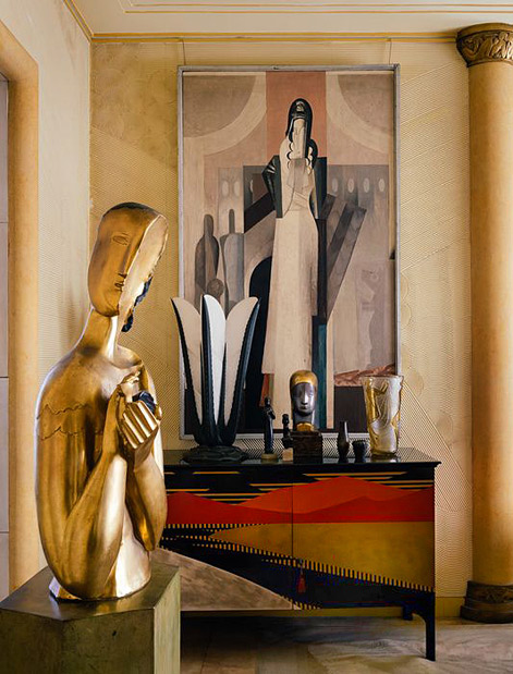 Félix-Marcilhac´s-Paris-apartment-Painting-by-Gustave-Miklos-Figures-et-Chien-(1921),-Jean-Dunand-cabinet-(1921)-and-Ozzip-Zadkine´s-Jeune-Fille-á-la-Colombe-(1928)-gold-plated-statue
