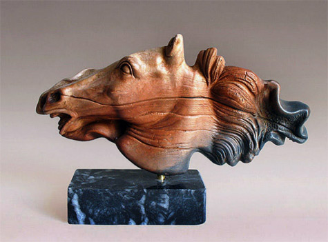 Modern GReek sculpture of a horse head on a marble base byYiannis Nanouris