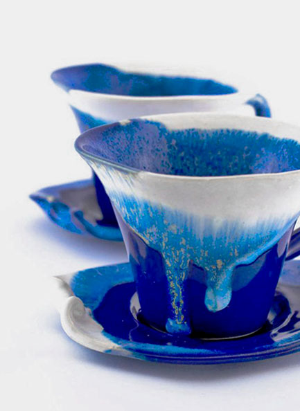 Two blue and white-teacups with drip glaze 