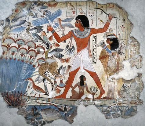 A painting from the tomb of Nebamun showing him standing on a reed boat hunting birds in the papyrus marshes using throwsticks and three decoy herons