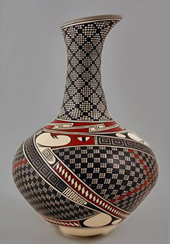 Hector-Gallegos urn with a Quetzalcoatl serpent and Native American feather symbol