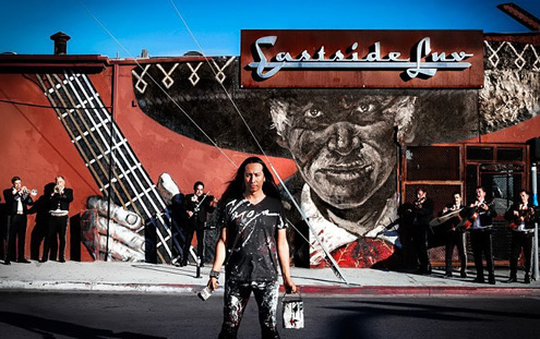 LA artist/mural painter Robert Vargas with his street art