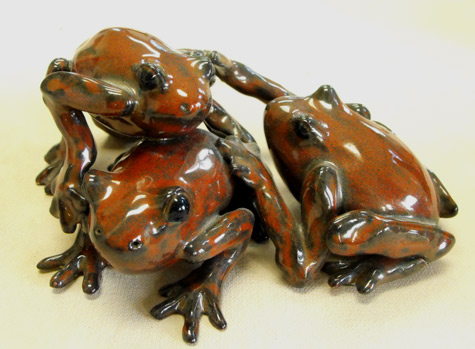 frogpile-Pauline-Do - Three orange frogs together
