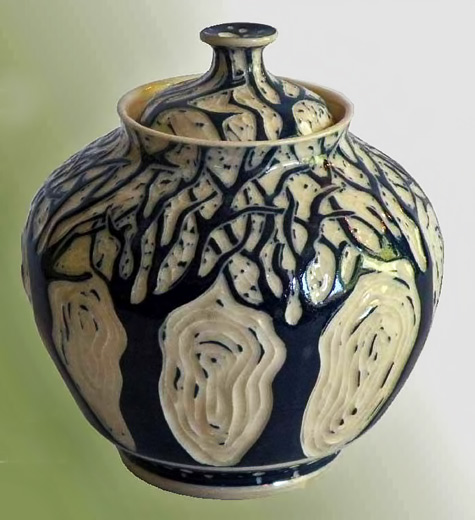 Black and cream lidded vessel with tree motifs - Paul Cooley