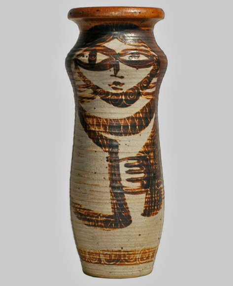 Mid-Century-Modern-Double-Face-Ceramic-VaseHARVEYS-ON-BEVERLY-1955earthenware-vase-features-a-woman-on-either-side.-The-women-are-painted-in-a-folk-art-manner