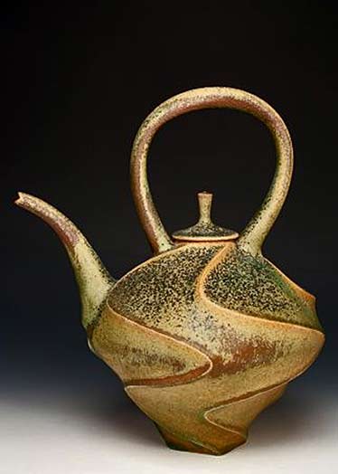 Jim-Connell-teapot with relief swirls