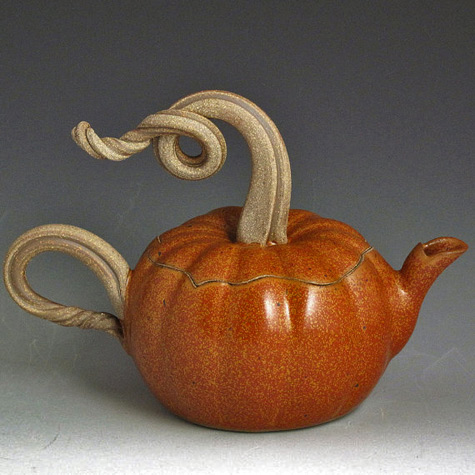 John Bauman stoneware teapot pumpkin shape with curly handled lid 