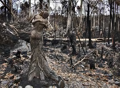 embracing couple sculpture in a forest after a bushfire - Bruno's garden