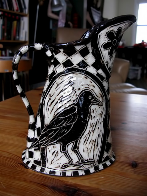 Chandler-Swain - black and white glazed black bird pitcher with chequered background