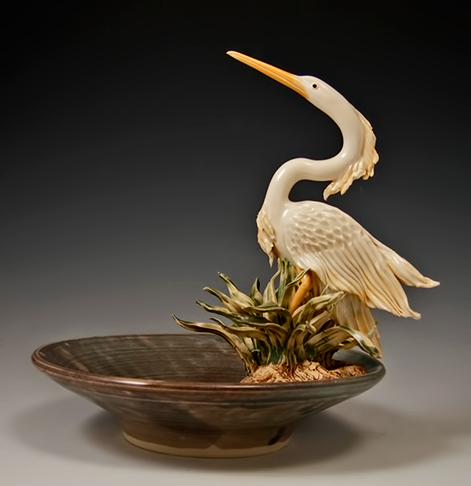 Wheel-thrown-bowl-with-sculpted-Heron-attached-on-a-rock-with-reeds