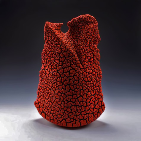 Randy-O'Brien red textured ceramic vessel