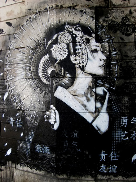 Street-art-by-Fin-Dac---such-delicacy-on-a-completely-non-accomodating-canvas...