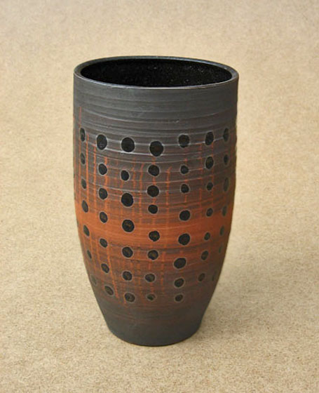 andreas-rauch-orange and dark grey vessel with holes