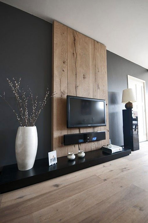 houzz--interior-decor white ovoid vase and spherical ceramics contrasting the strong black lines