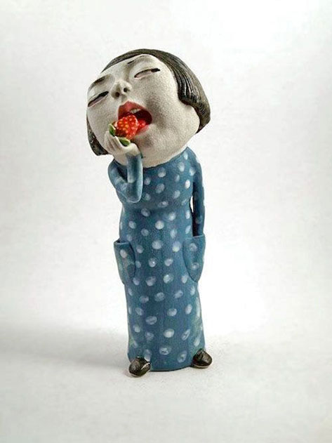 Dai-Li=ceramic figurine of a Chinese girl eating a strawberry