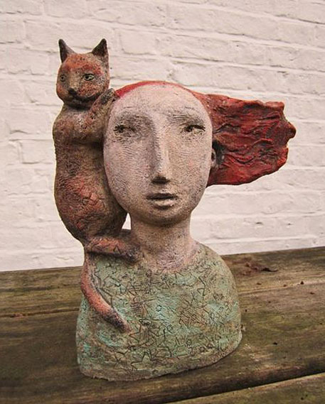 Frances-Baruch - textured ceramic bust of a red haired woman with a cat on her shoulder