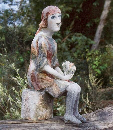 Valentina-Kuznetsova sculpture of a lady sitting with flowers