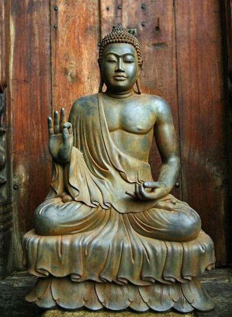 Seated Buddha sculpture-with-his-hand-in-the-teaching-mudra