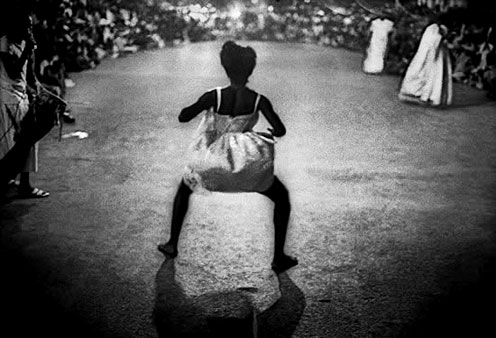 Frank-Horvat photo of a girl dancing in the street