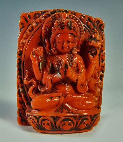 rare-hand-carved-red coral-statuette-displaying-the-four-armed-Bodhisattva-of-Compassion