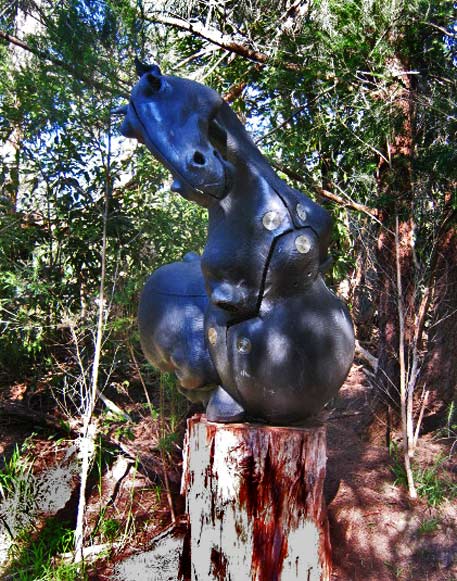 mcclelland-gallery-permanent-collection 'Waterhole' by Sergio Hernandez Merchan seated horse sculpture