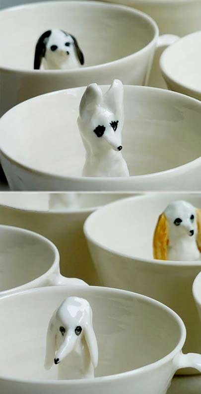 Eleonor Bostrom ceramic drinking cups with internal dog figures