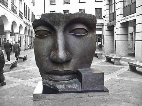 igor_mitoraj_ street sculpture of a large face