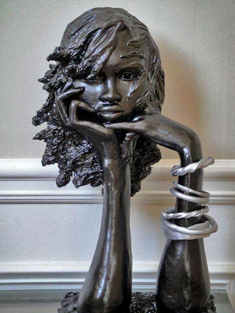 Gerald-Lilliard bust of a girl in contemplation