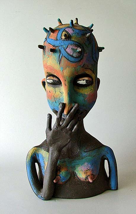 Inna Olshansky smiling ceramic cow sculpture female bust in rainbow colours