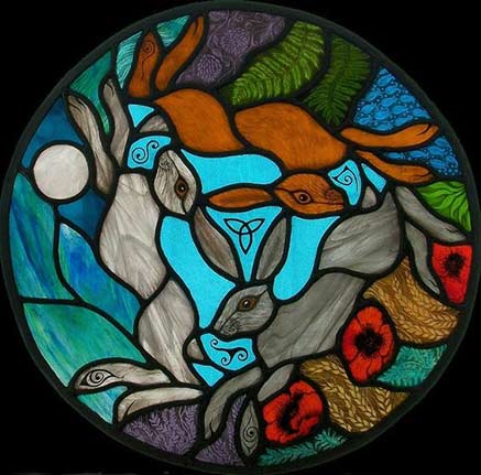 sacred three hares symbol stained glass