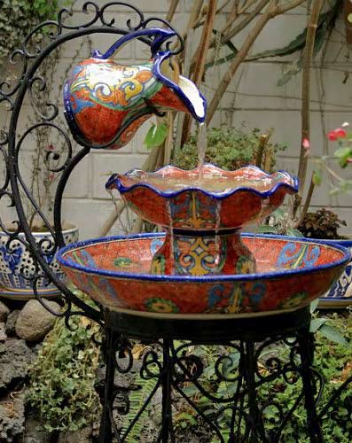 mexican talavera jug an bowl in iron frame fountain