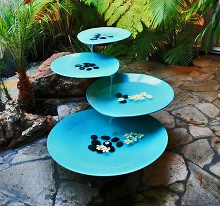 turquoise fountain with cascading discs