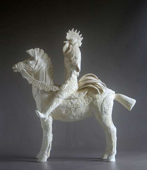 Sally White porcelain rooster riding a horse