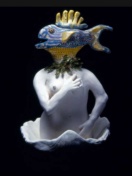 Carol-Gentithes-sculpture of a fish headed torso in a large sgell