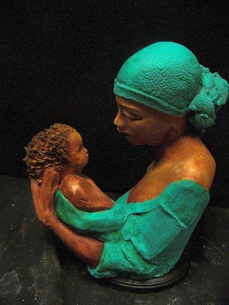 Woodruff Nash mother holding child bust - Women with green headscarf holding a baby
