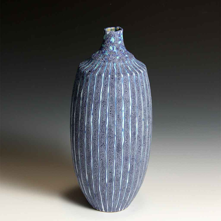 Peter-Beard-ceramic-vertical striped bottle light blue and lavender