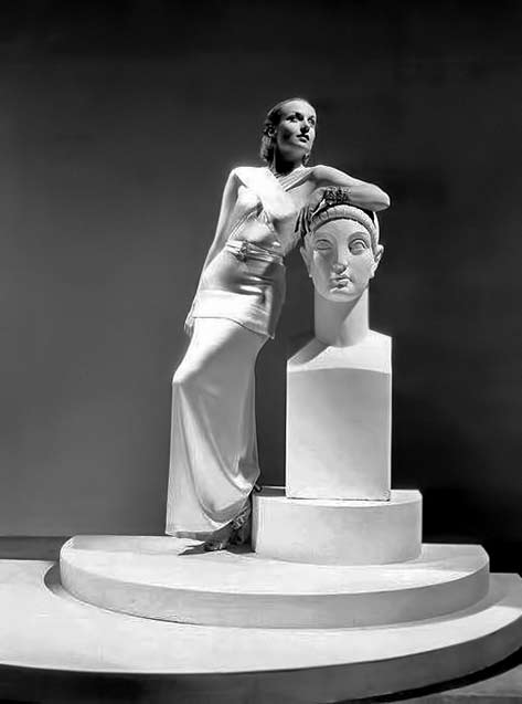 Carole lombard with winking greek bust sculpture