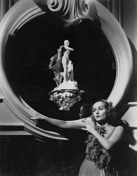 Carole-Lombard with nude figure sculpture