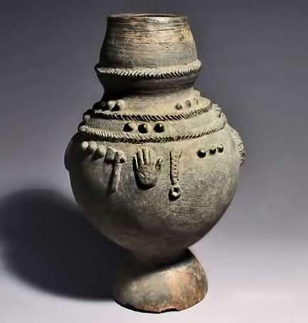 Ritual pot with symbols from Ewe tribe in Togo