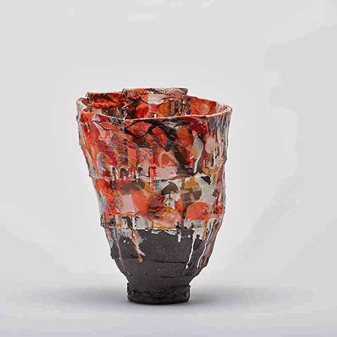 drip glaze footed vase in red, brown and white