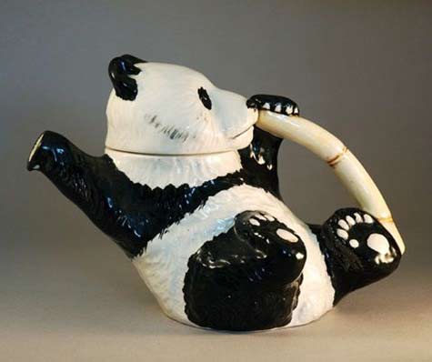 Panda eating bamboo teapot