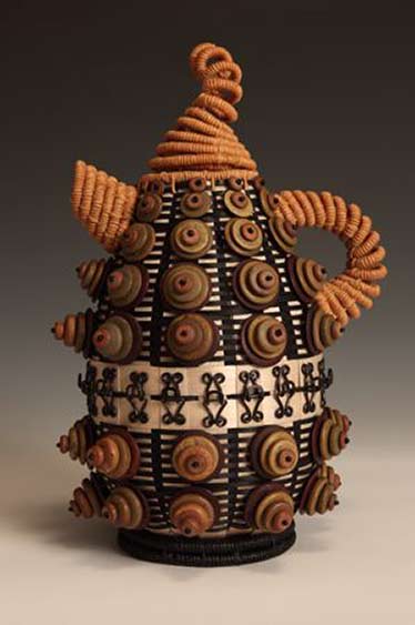 Joanne-Russo teapot with geometric pattern in relief texture