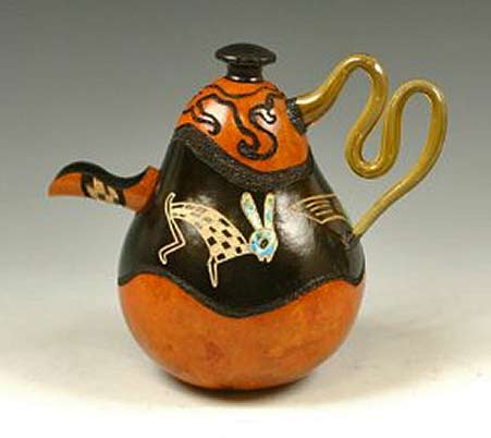 Gourd teapot with white rabbit motif on black and orange