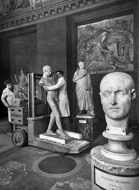 Louvre-Museum-1953-Paris- Dmitri Kessel Curators moving a Greek statue