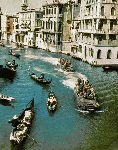 Venice Gondola & US DUKW amphibious trucks on the canal in Venice