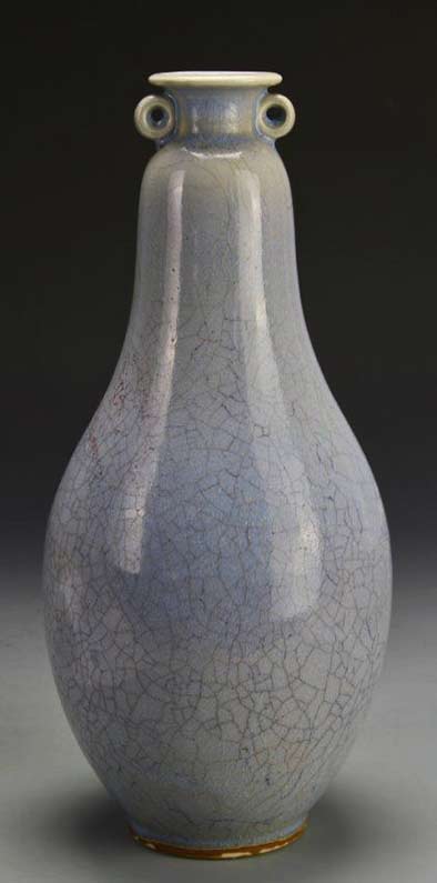 China, 20th C., Jun ware glazed vase, in an elongated pear form, with four character mark on base.